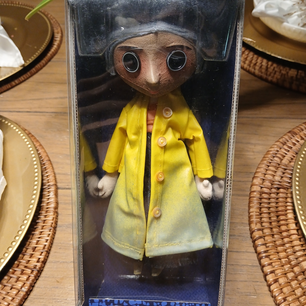 Yellow Raincoat Figurine